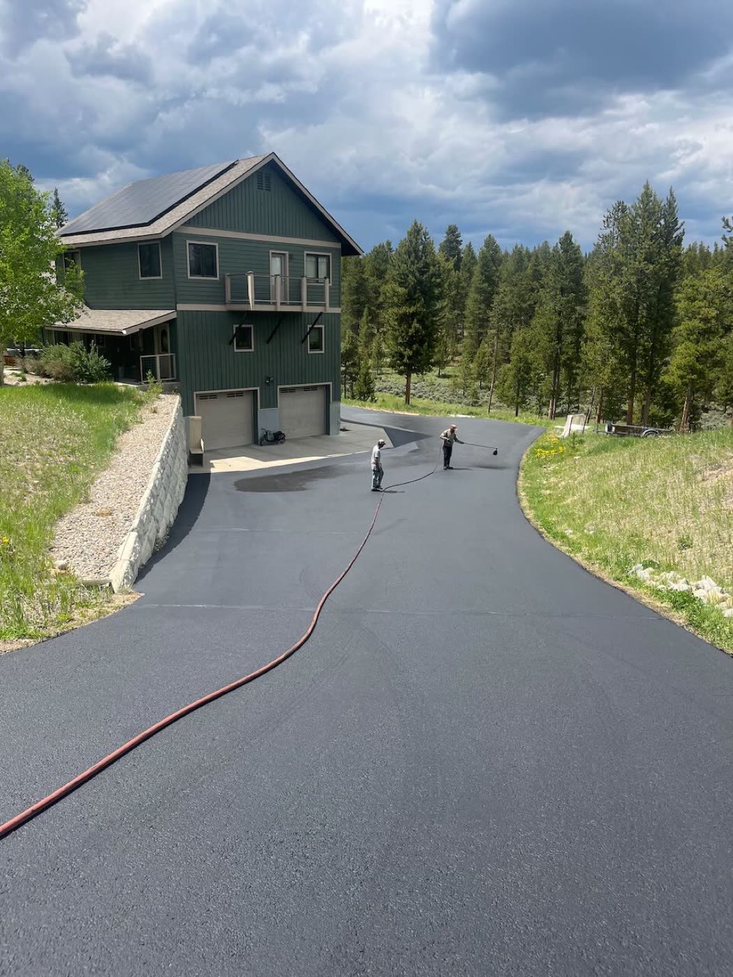 Driveway seal coat and crack sealing — Grand County mountain property