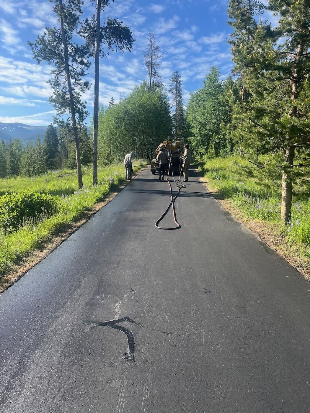 Crack sealing and seal coat completed — Grand County driveway