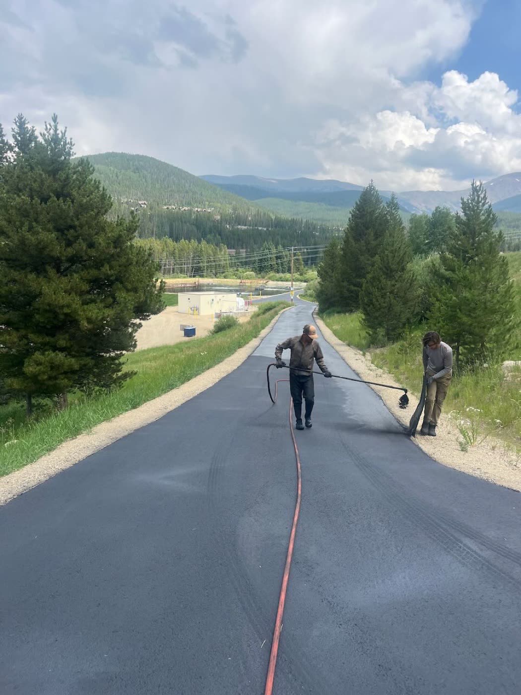 Parking lot maintenance — crack sealing and line striping Grand County