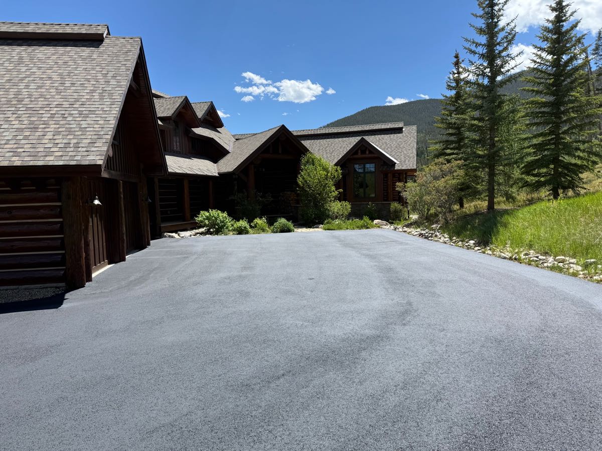 Seal coated driveway at a log cabin mountain home — Grand County, CO